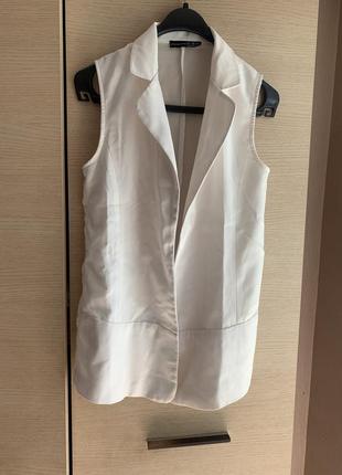 Жилетка