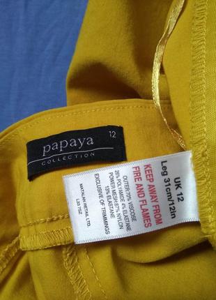 Актуальные желтые женские бриджи бермуды papaya 12/xl/523 фото