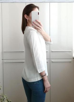 Белая блузка из вискозы с рукавом 3/43 фото