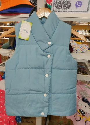 Безрукавка на дівчинку стильно