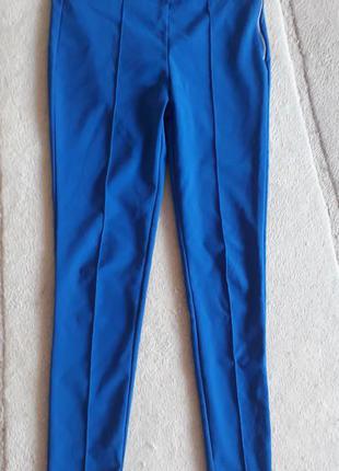 Яркие синие брюки3 фото