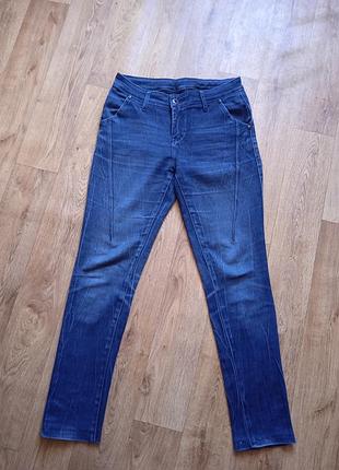 Джинси завуженні