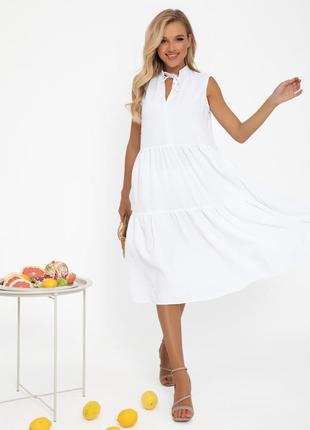 Біла вільна сукня-трапеція без рукавів1 фото