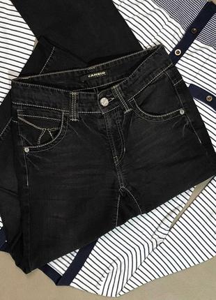 Коричневі джинси cambio