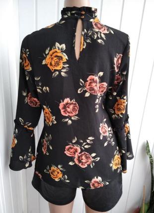 Блуза в цветьі з длинньім рукавом2 фото