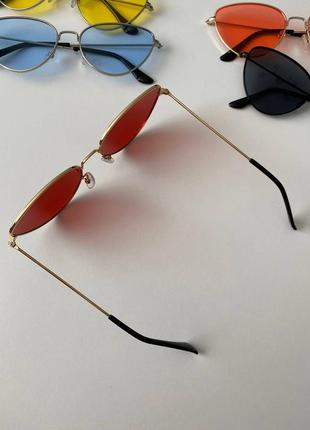 Сонцезахисні окуляри котяче око 2022 червоні в золотий металевій оправі7 фото