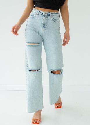Широкі джинси з прорізами