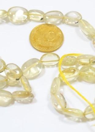 Бусины на нитке натуральный камень цитрин овал l=45см