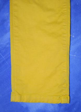 Стильные стрейч джинсы c.d.c. ярко-жёлтого цвета.6 фото
