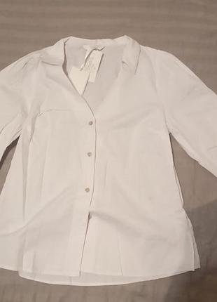 Белая блуза с декольте на пуговицах длинный рукав
