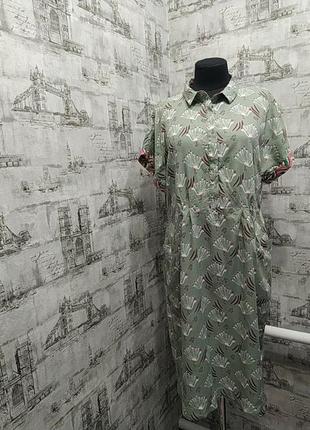 Зелене з розовымм павичами сукня з кишенями, з красиві рукавом, дуже м'яке і легке, не тягнеться пояс