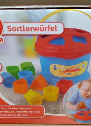 Комплект розвиваючих наборів для малюків playtive  ведерко-сортер та пірамідка-скляночки.4 фото