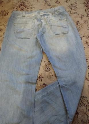 Брендовые голубые джинсы6 фото