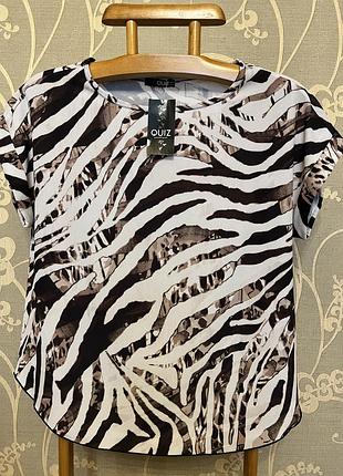 Дуже гарна і стильна брендовий блузка.