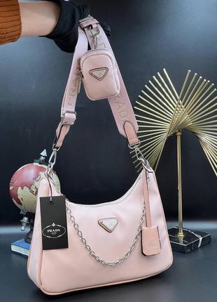 Трендова пудрова рожева жіноча сумочка в стилі prada re-edition light pink женская розовая пудра нейлоновая сумка бренд новинка