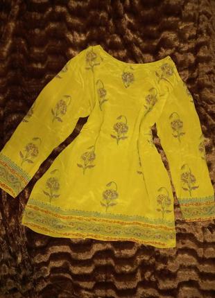 Легкая желтая блуза с принтом1 фото