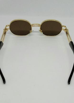 Очки в стиле versace стильные овальные солнцезащитные очки унисекс коричневые в золотой металлической оправе5 фото