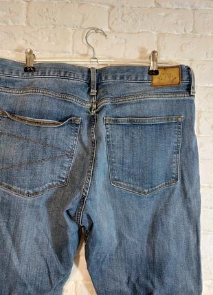 Фирменные стрейчевые джинсы 34р.4 фото