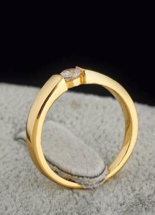 Позолоченное кольцо с фианитом3 фото