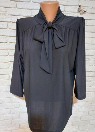 Черная блуза.