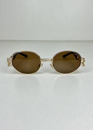 Солнцезащитные очки унисекс коричневые  овал3 фото