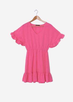 Яркое ярусное воздушное розовое платье с рюшами5 фото