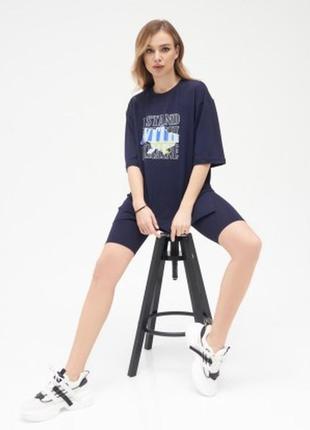 Трикотажна асиметрична футболка з принтом та розрізами (is)