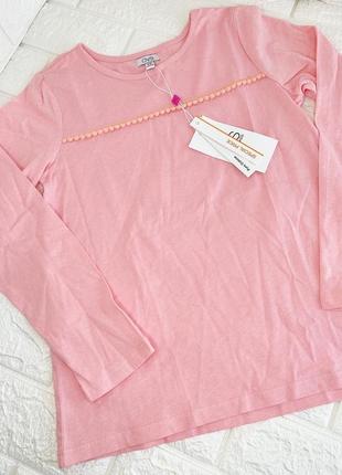 Легкая футболка с длинным рукавом в розовом цвете.