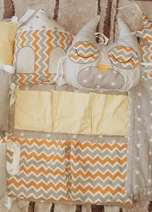 Комплект подушек-бортиков для кроватки1 фото