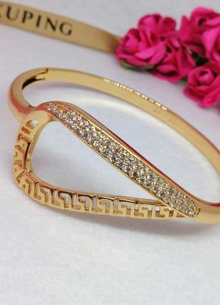 Красивий жіночий браслет з грецьким візерунком з медичного золота. позолочений браслет хр1 фото