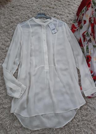 Стильная вискозная блуза в молочном цвете1 фото