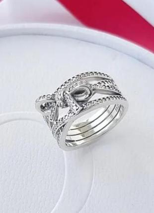 Серебрянное кольцо бантик бесконечное сияние2 фото