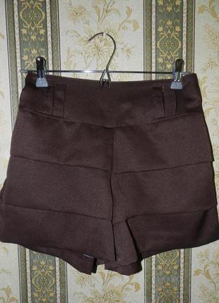 Бомбезные стоковые шорты - юбка с широким поясом сзади и резинкой на талии. "s-m" размер.1 фото