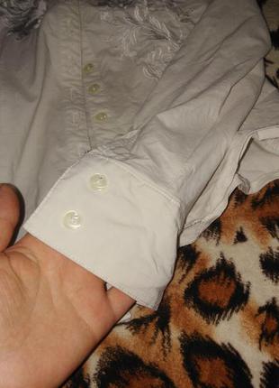 Красивая белая блуза с вышивкой белыми нитками5 фото
