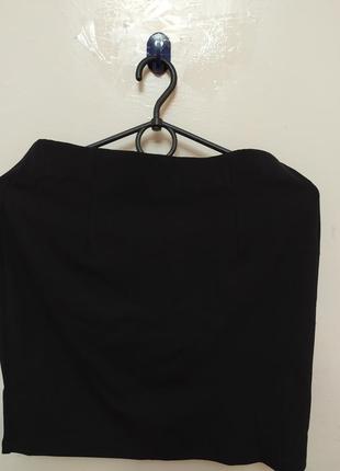 Продам черную короткую юбку с замком спереди5 фото