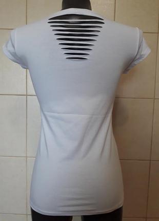 Красива стильна біла футболка з розрізами на спині divon,one size(40,42,44)2 фото