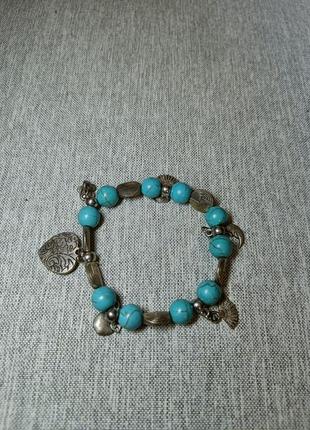 Браслет с камнями и подвесками