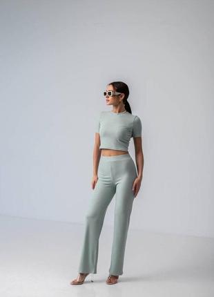 Эффектный женский летний костюм мятного цвета: топ и брюки 42, 44, 466 фото