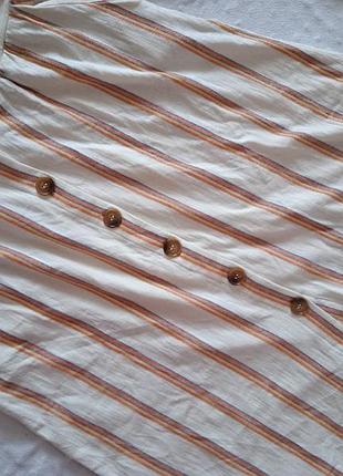 Спідниця міді з гудзиками спереду