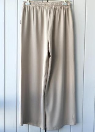 Шикарні широкі   штани-палаццо bihruze .5 фото