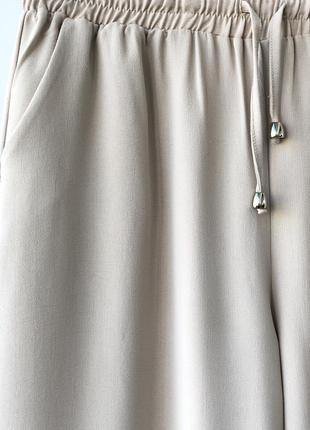 Шикарні широкі   штани-палаццо bihruze .2 фото