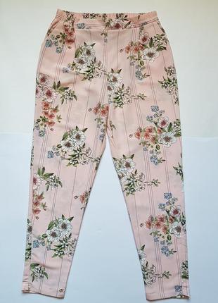 Стильные летние штаны в цветочный принт, шикарные легкие брюки в цветочный принт1 фото