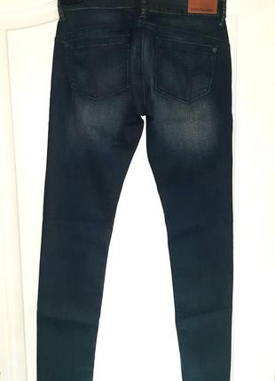 Стильные синие джинсы calvin klein. размер-w28/l308 фото