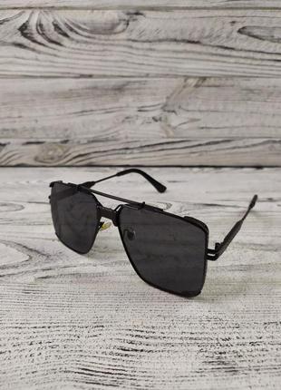 Сонцезахисні окуляри чорні унісекс1 фото