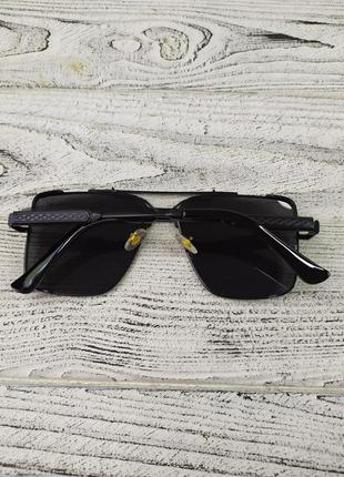 Сонцезахисні окуляри чорні унісекс6 фото