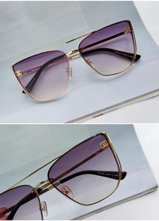 Сонцезахисні окуляри в бузковому кольорі1 фото