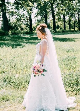 Неймовірна весільна сукня4 фото