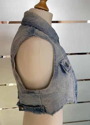Короткий джинсовий жилет4 фото