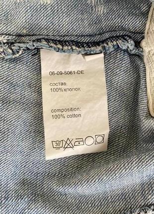 Короткий джинсовий жилет7 фото