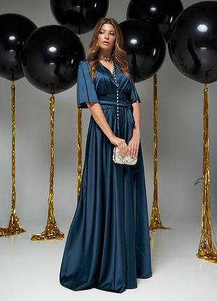 Красивое вечернее платье изумрудного цвета